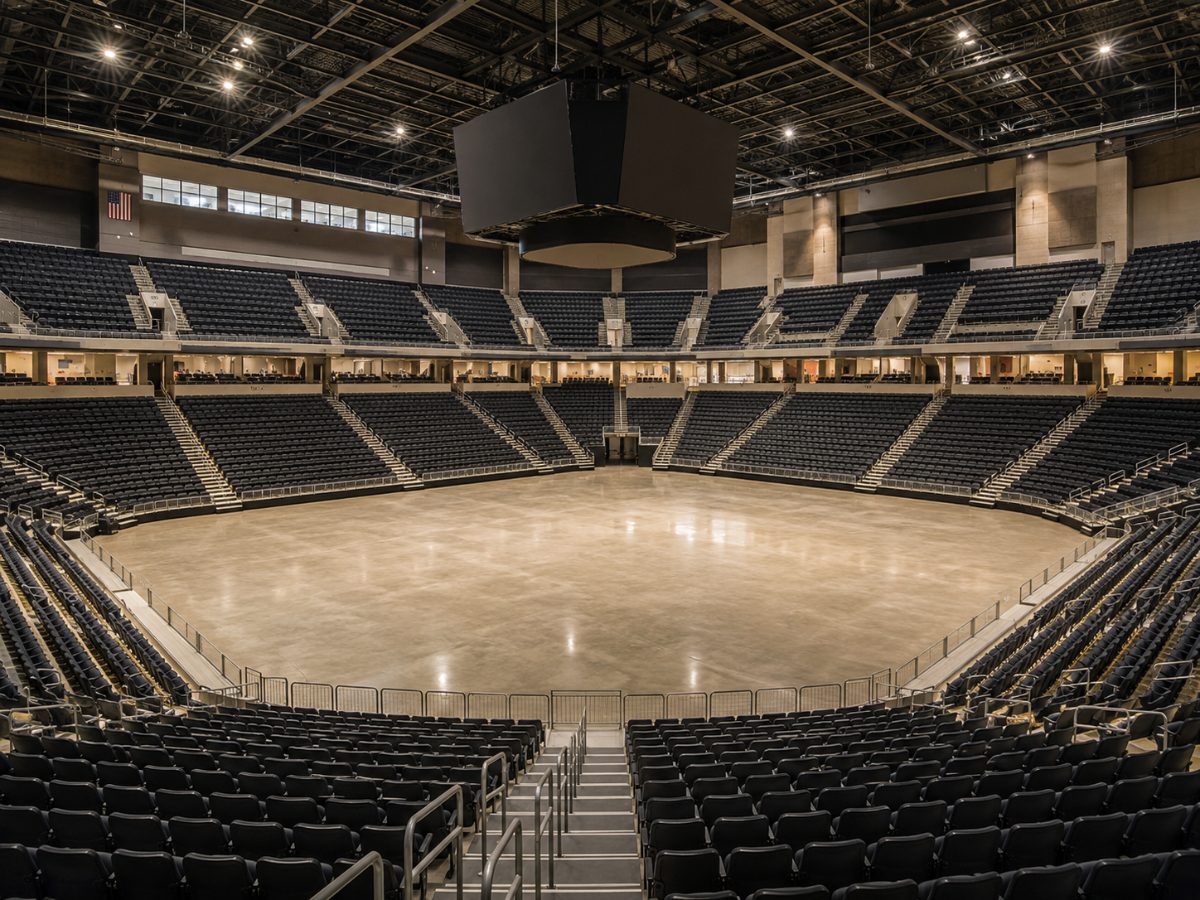 Empty arena bowl with seating and an open floor